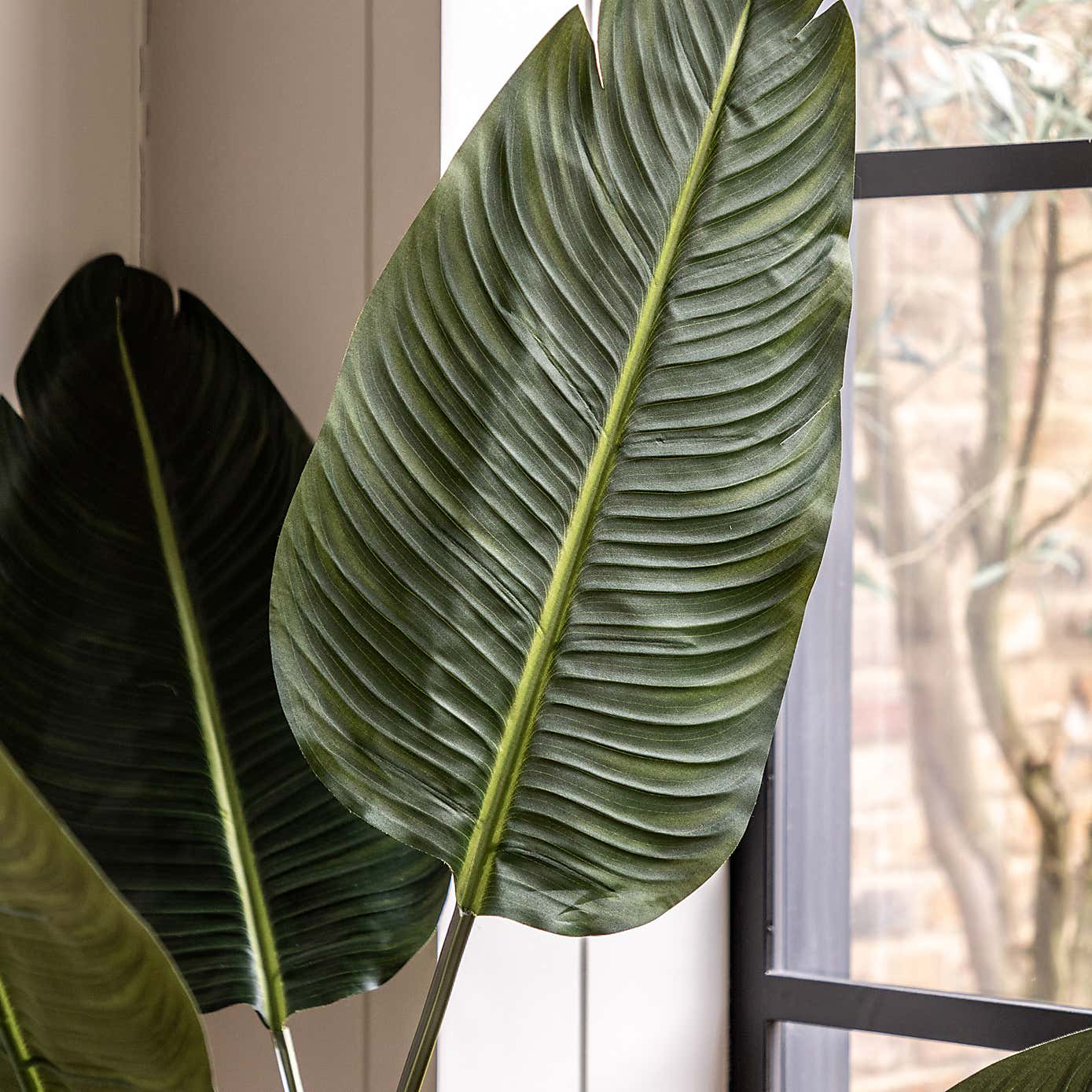 Artificial Small Travellers Palm Tree in Black Plant Pot